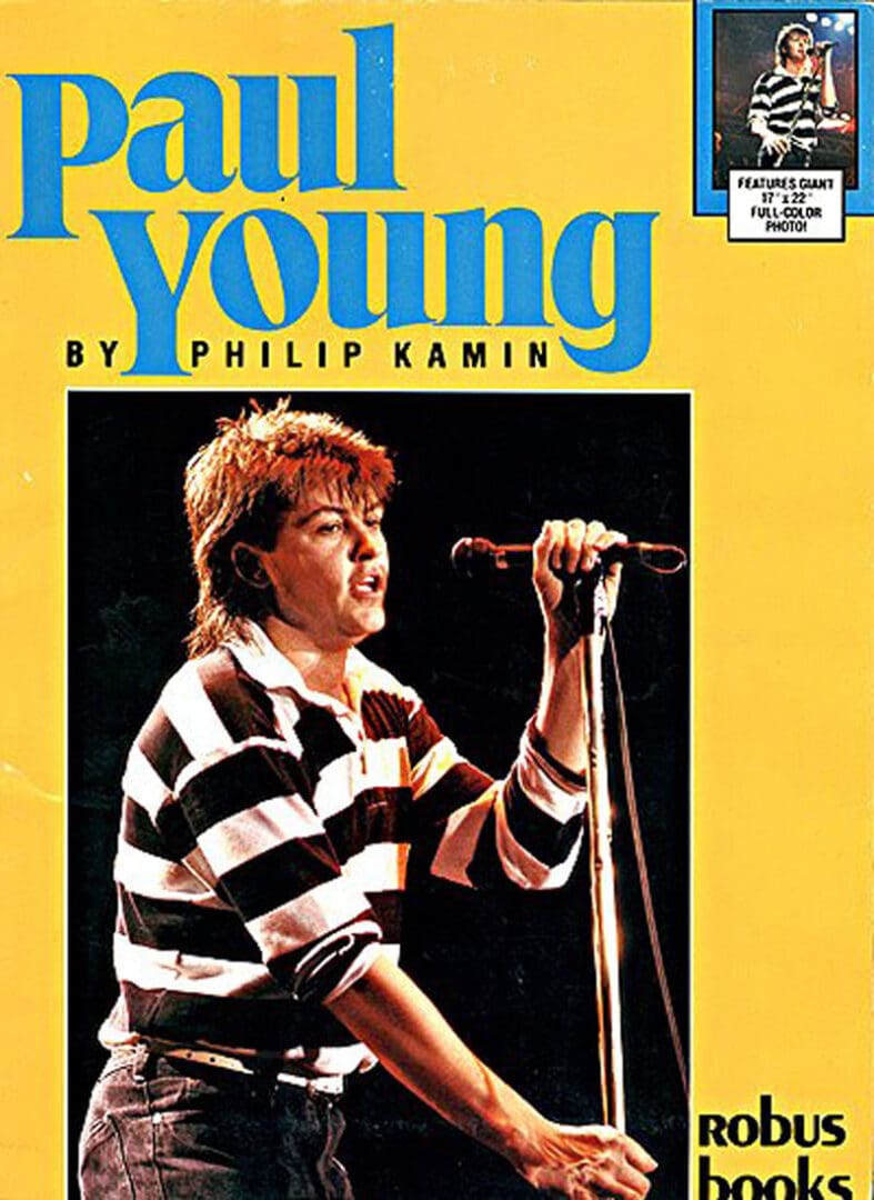 A book cover with a man holding a microphone.