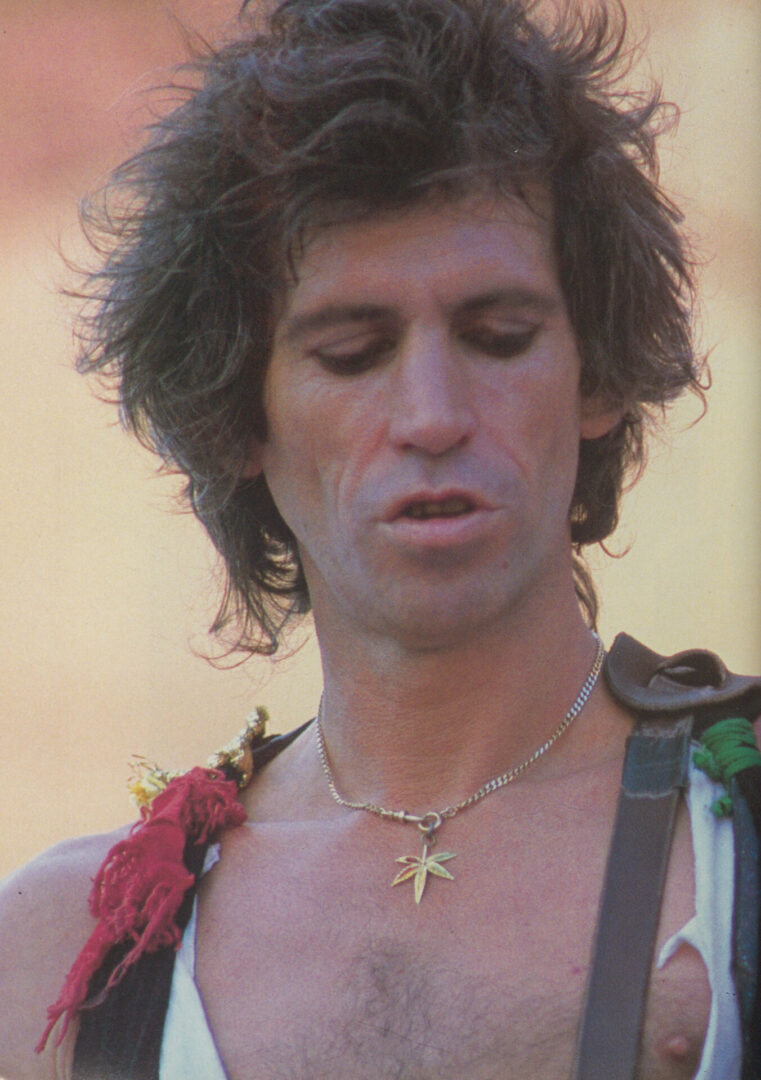 A close up of a person wearing a necklace